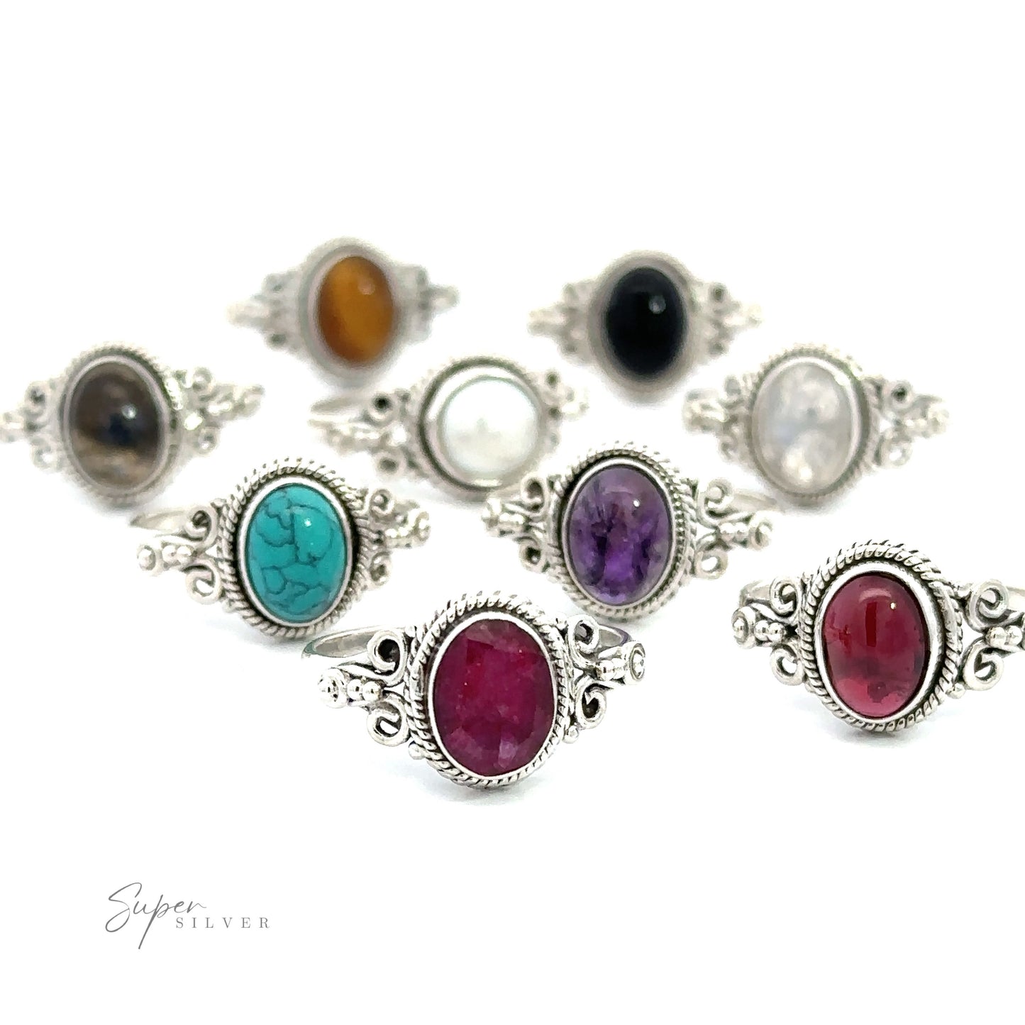 A collection of Natural Oval Gemstone Rings with Intricate Rope and Long Spiral Border displayed against a white background.