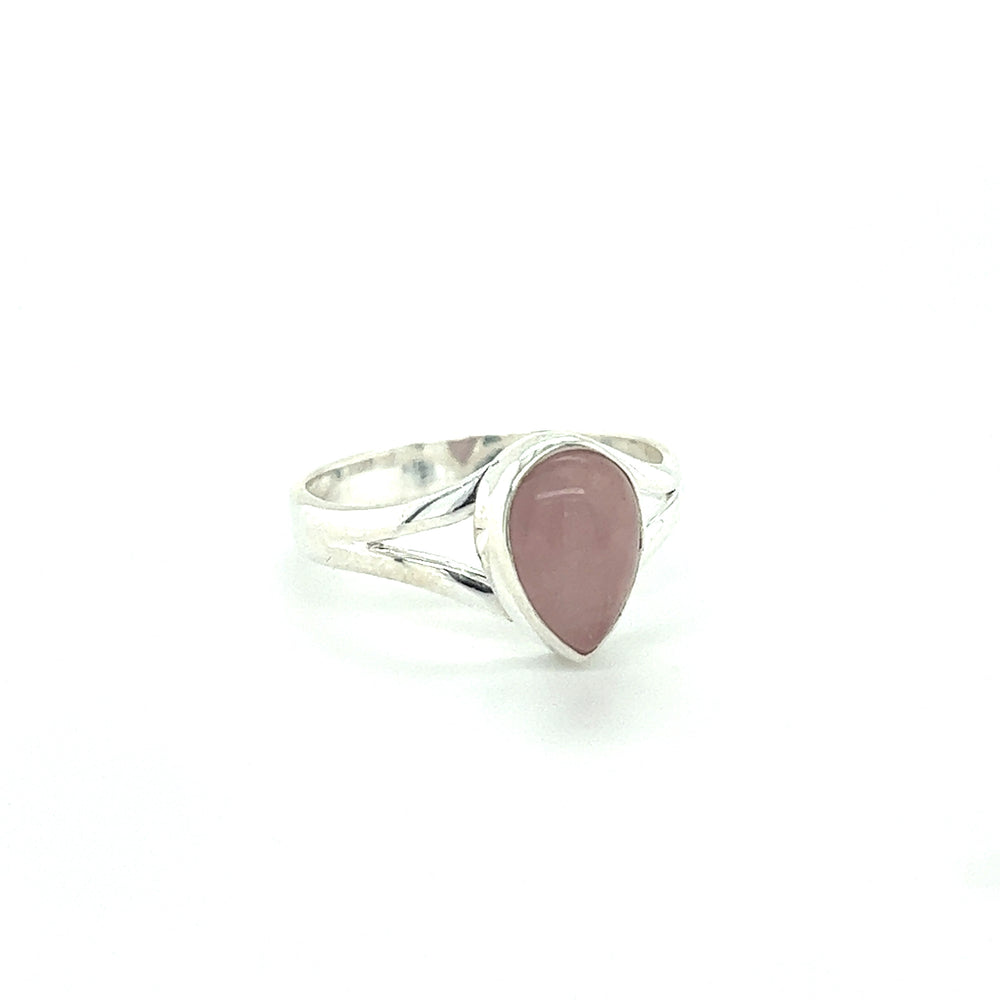 
                  
                    A Simple Teardrop Shape Gemstone ring crafted in Super Silver, featuring a mesmerizing pink stone.
                  
                