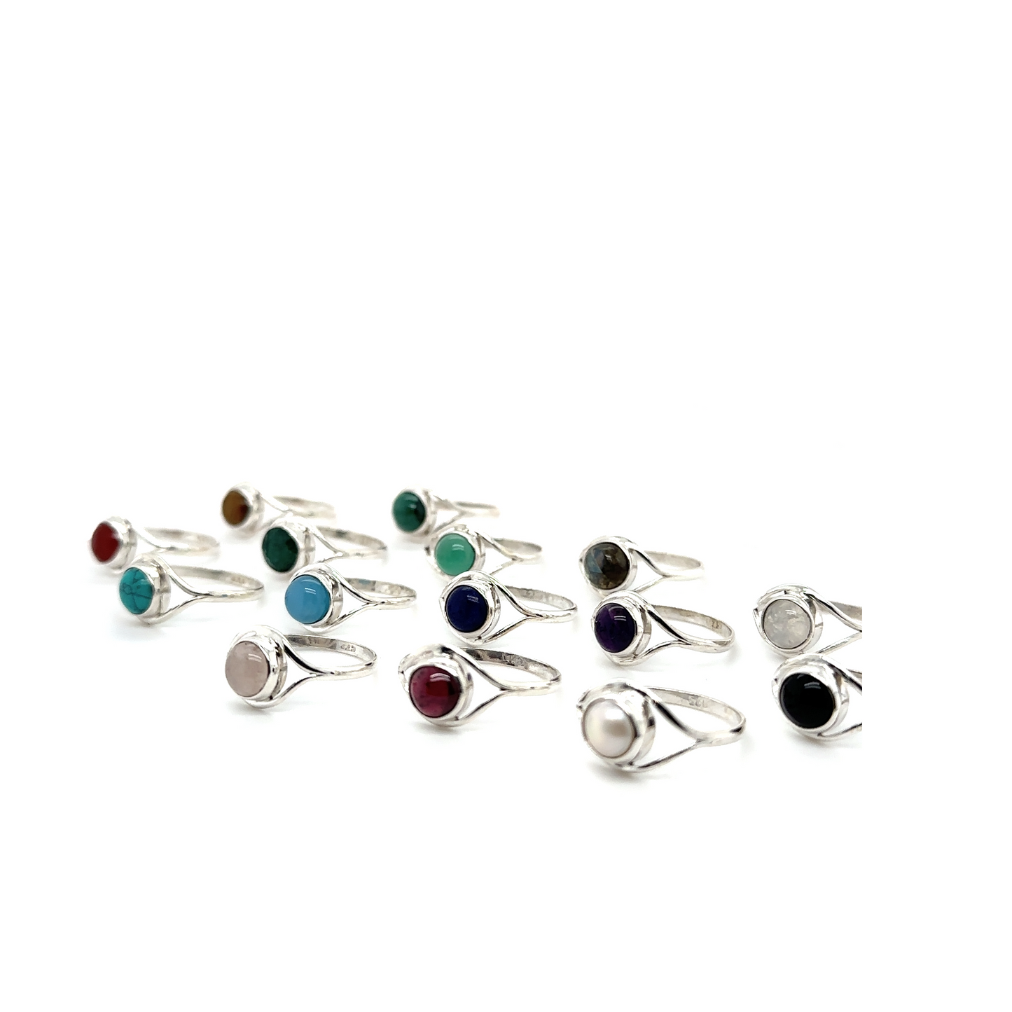 
                  
                    A contemporary aesthetic group of Abstract Stone Eye Rings, featuring different colored gemstones.
                  
                