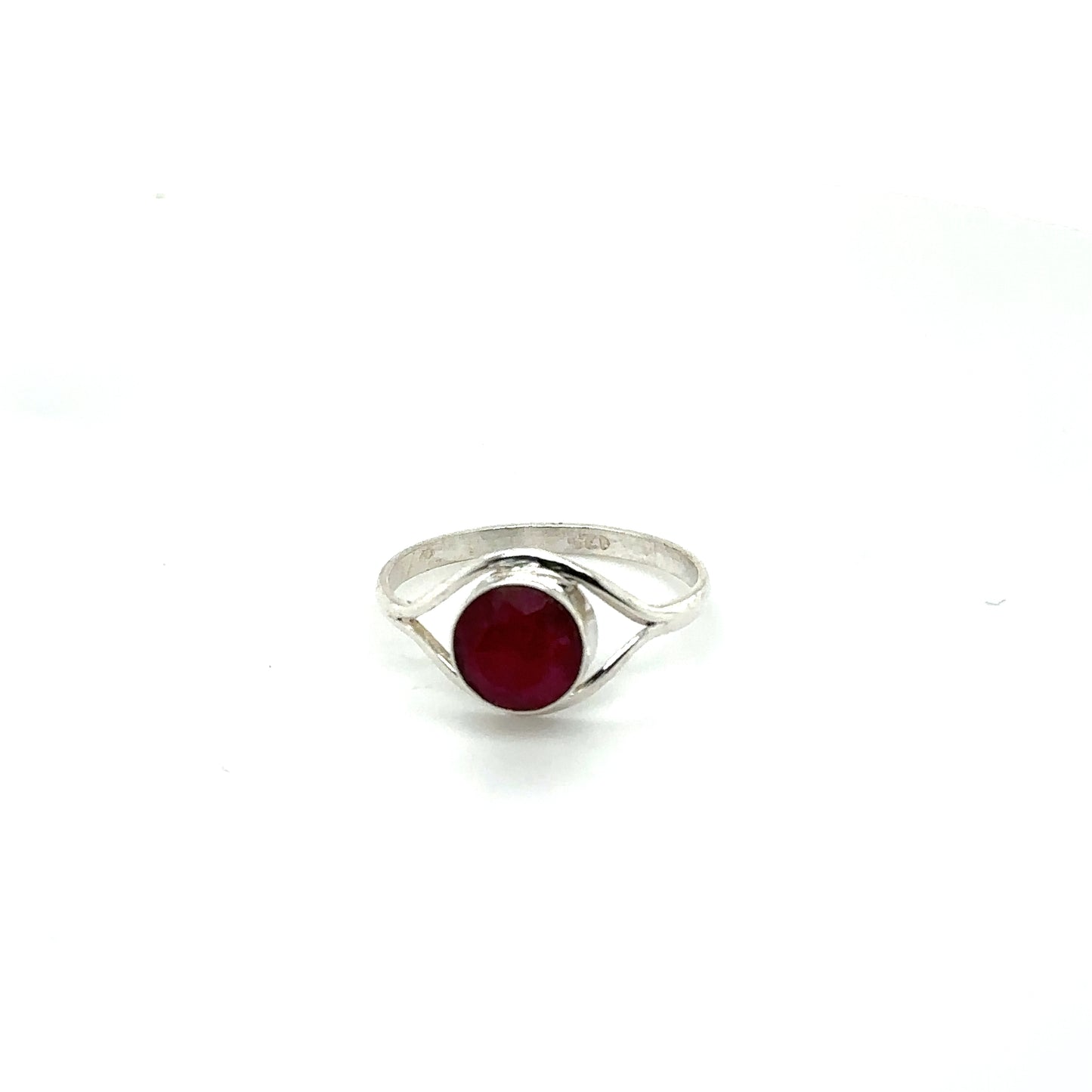 
                  
                    A contemporary Abstract Stone Eye ring with a ruby gemstone.
                  
                
