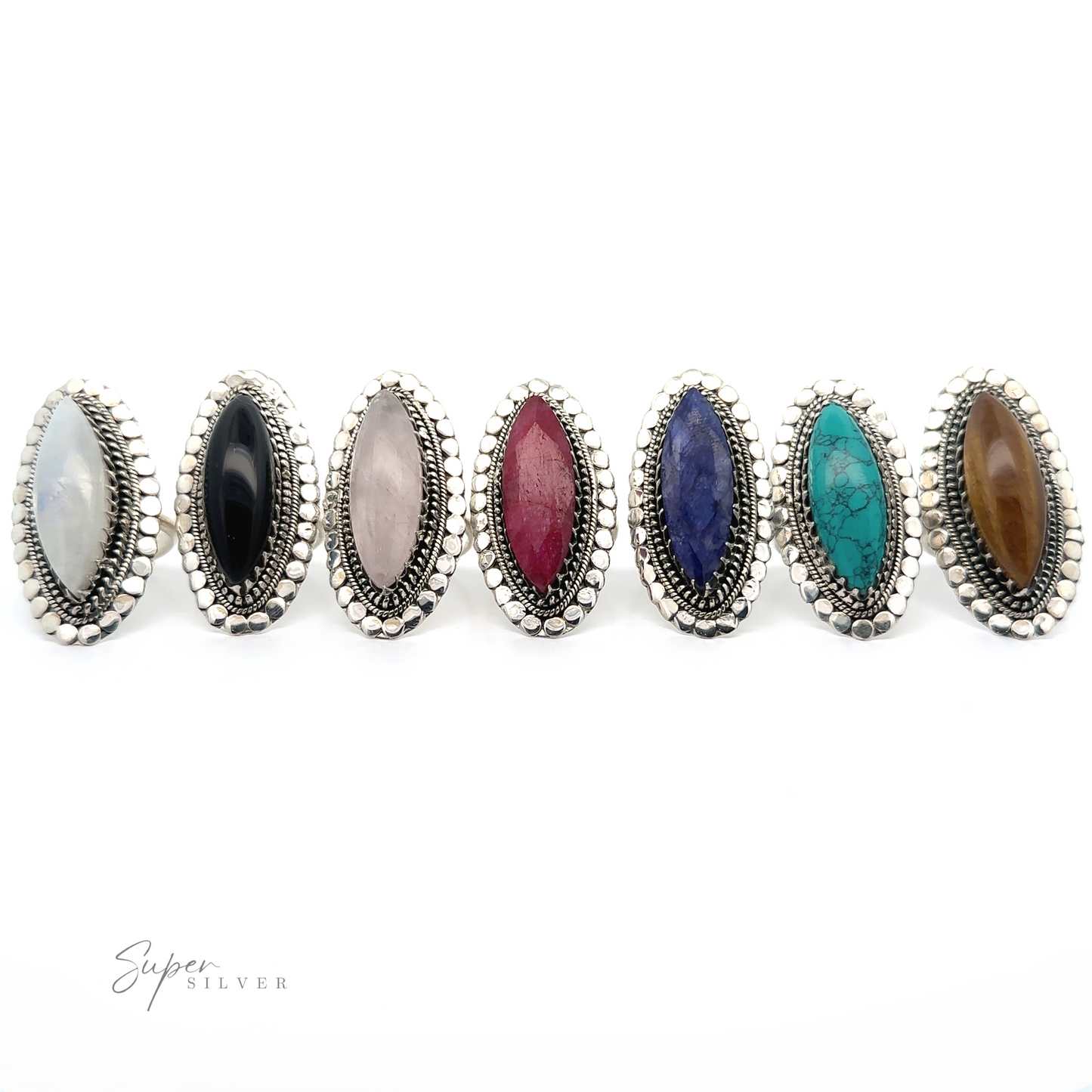 
                  
                    Seven oval rings with different colored stones set in silver on a white background. One standout is a Statement Marquise Shaped Gemstone Ring, adding a touch of bohemian jewelry charm to the collection. Text at the bottom reads "Super Silver.
                  
                