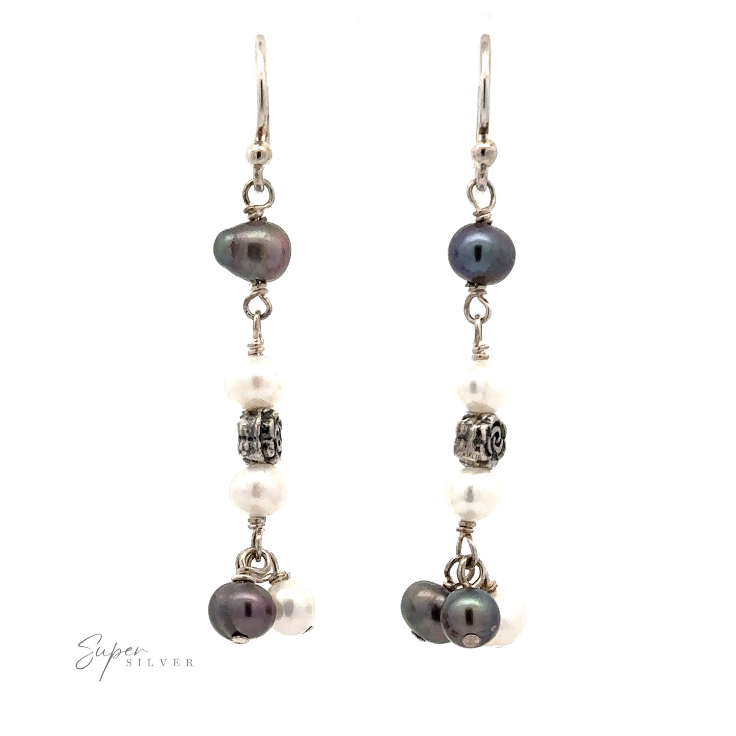 
                  
                    A pair of Floral Pearl Bead Earrings featuring black and white pearls with small silver accents, displayed against a white background.
                  
                