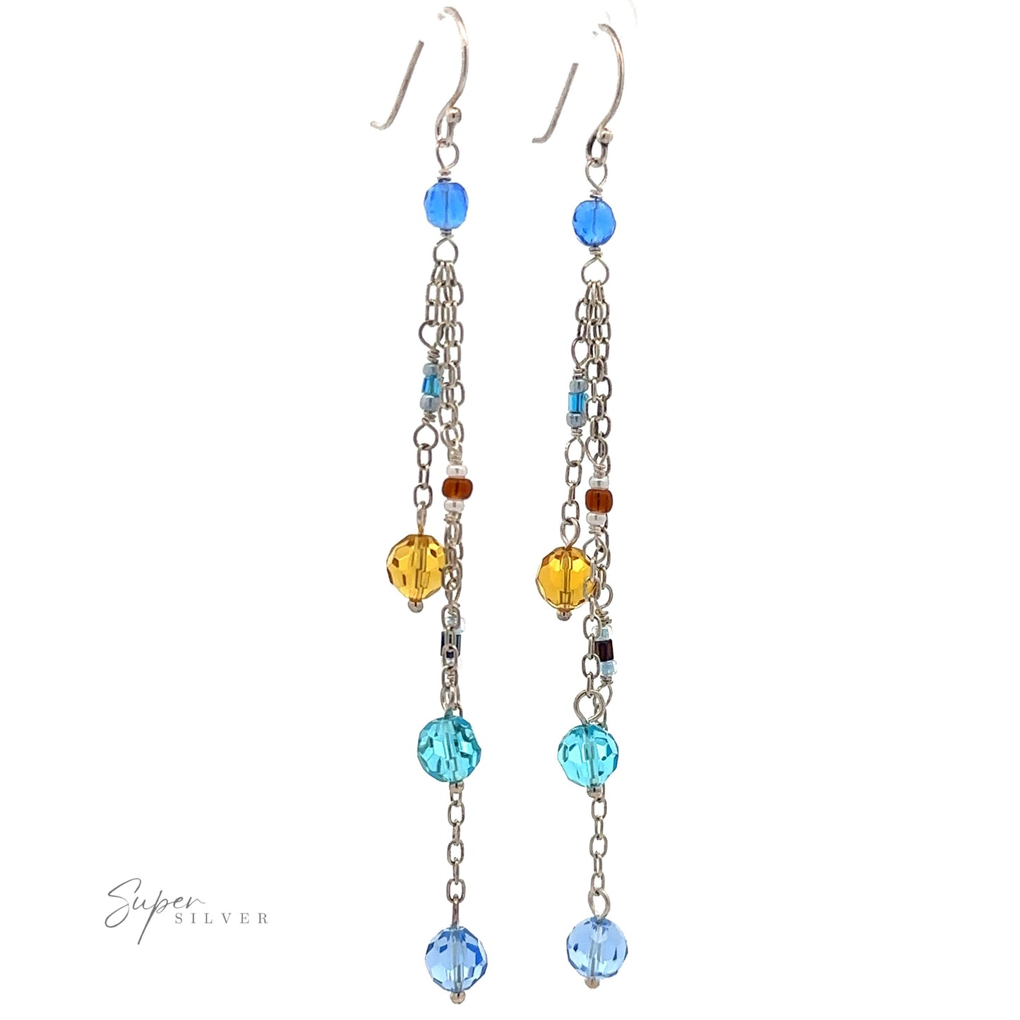 
                  
                    A pair of Multicolor Beaded Dangle Earrings featuring multicolored beads in blue, yellow, and brown, elegantly suspended on sterling silver chains.
                  
                