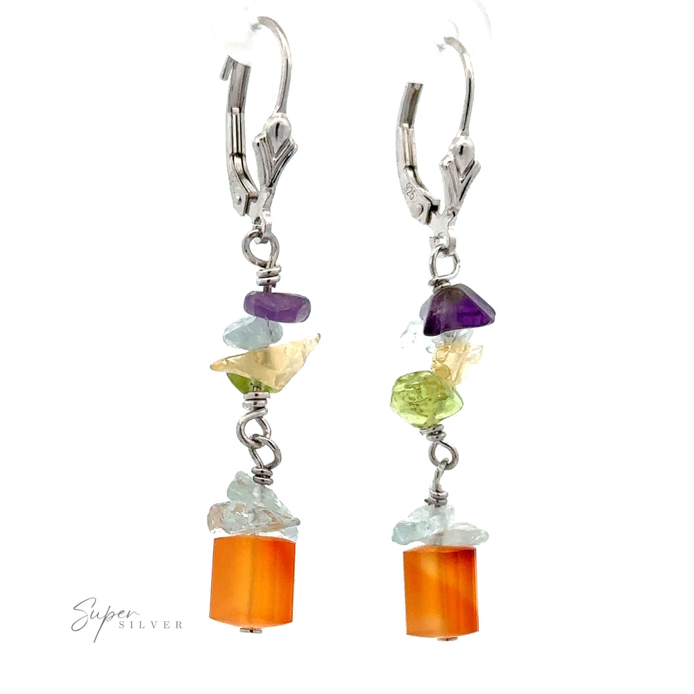 
                  
                    A pair of Beaded Multicolor Earrings with orange beads at the bottom, followed by clusters of multicolored stones in purple, green, and blue hues, and sterling silver clasps at the top.
                  
                