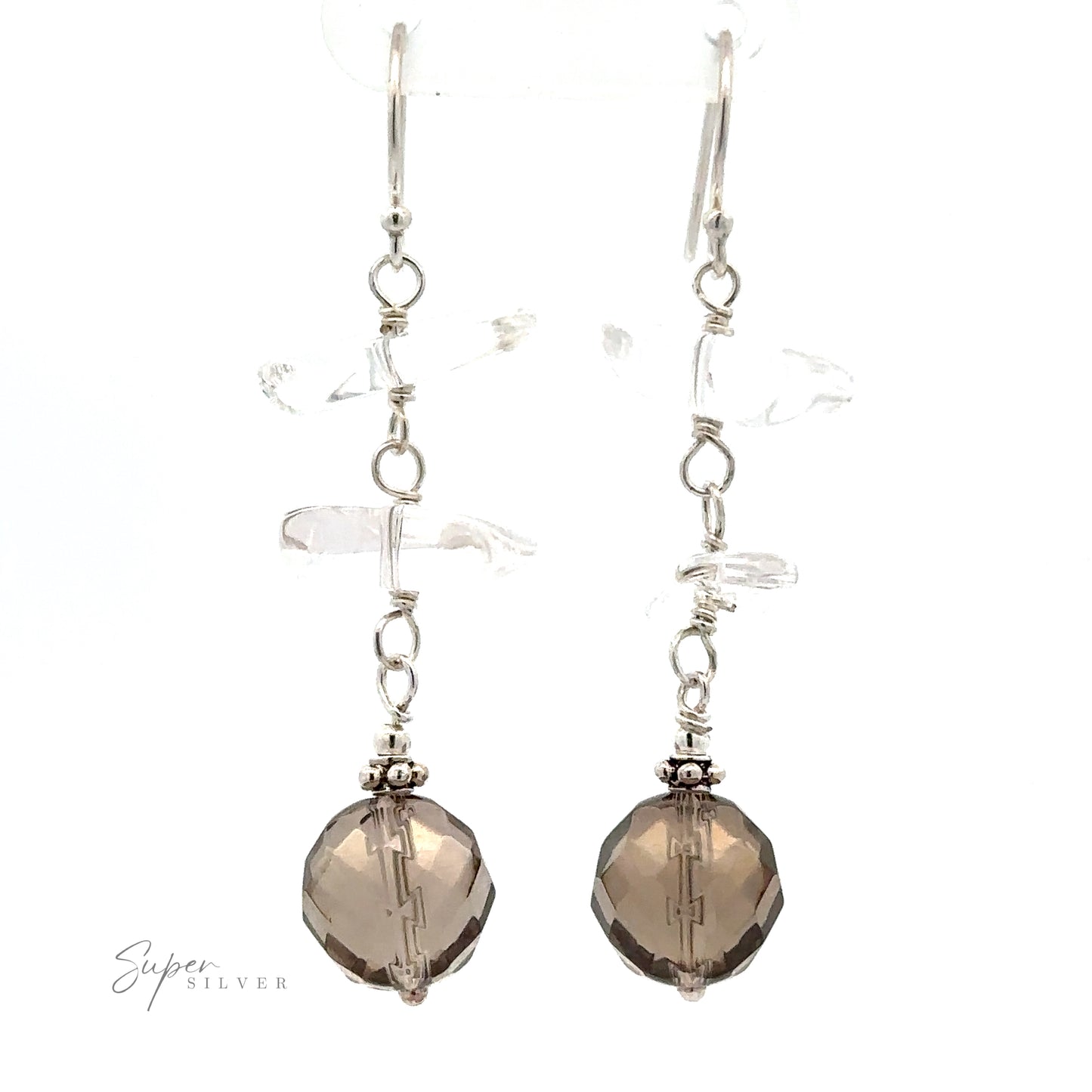 
                  
                    A pair of Earrings with Clear and Faceted Gray Beads featuring translucent and multicolored beads, complemented by larger smoky brown faceted beads at the ends. Crafted with thin sterling silver hooks, they offer a touch of elegance. "Super Silver" text is shown in the bottom left corner.
                  
                