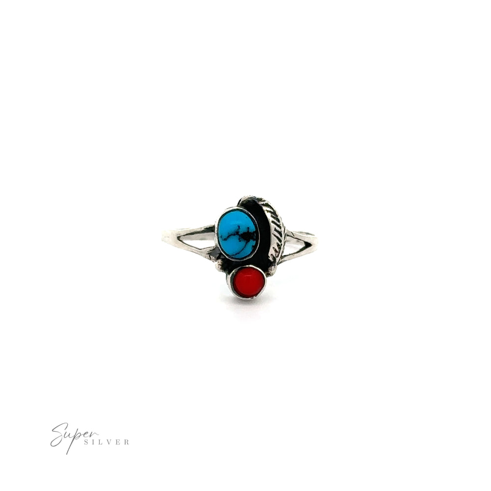 
                  
                    A Stone and Feather Ring with inlaid blue and red stones.
                  
                