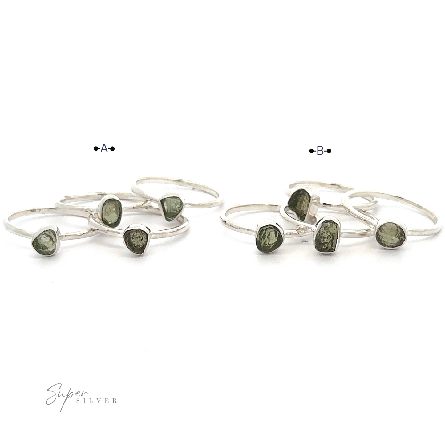 
                  
                    A set of sterling silver rings with Raw Moldavite gemstones, labeled A and B, displayed on a white background.
                  
                