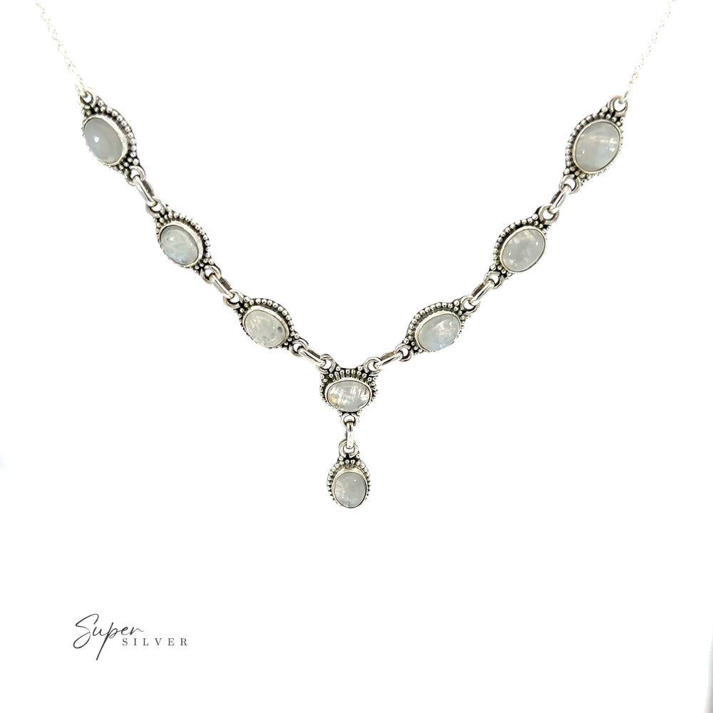 This beautiful Gemstone Y-Necklace with Beaded Border features a stunning Y-shaped design with a moonstone pendant.