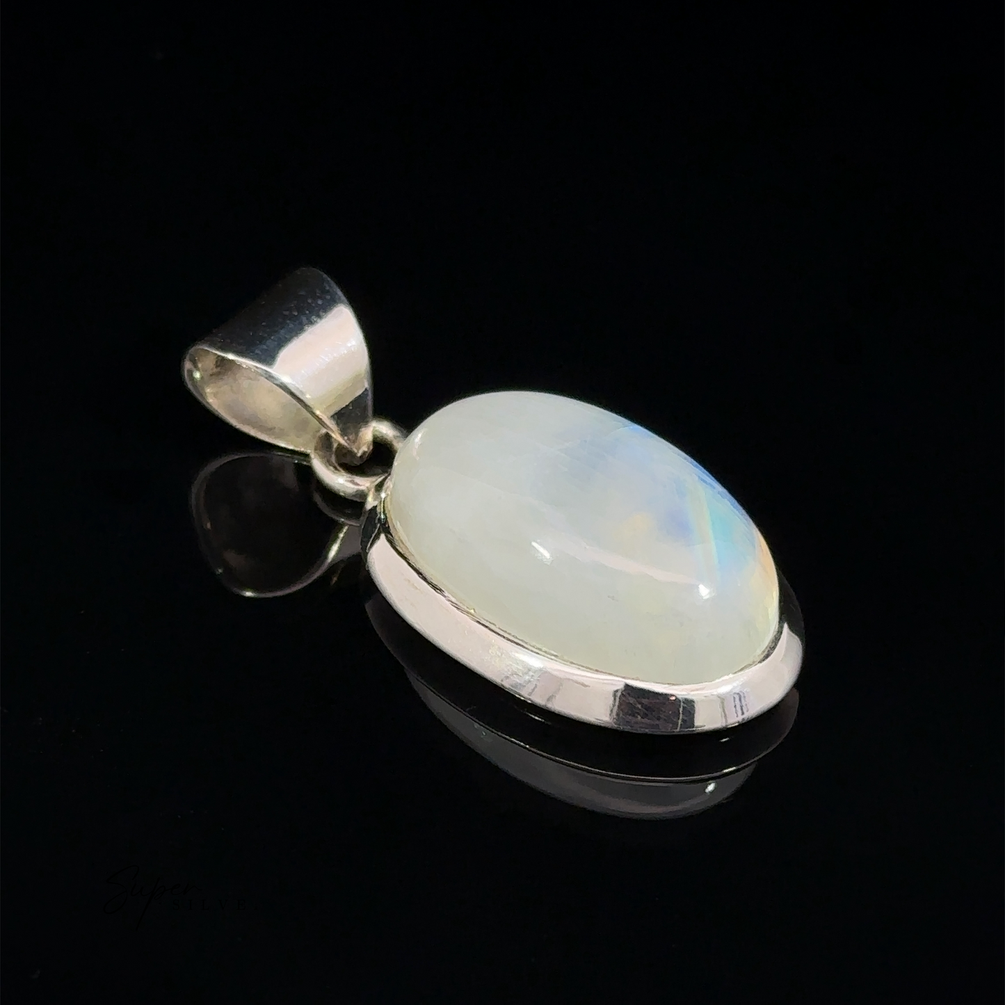 
                  
                    A Simple Moonstone Oval Pendant with a .925 sterling silver setting and loop, displayed against a black background.
                  
                