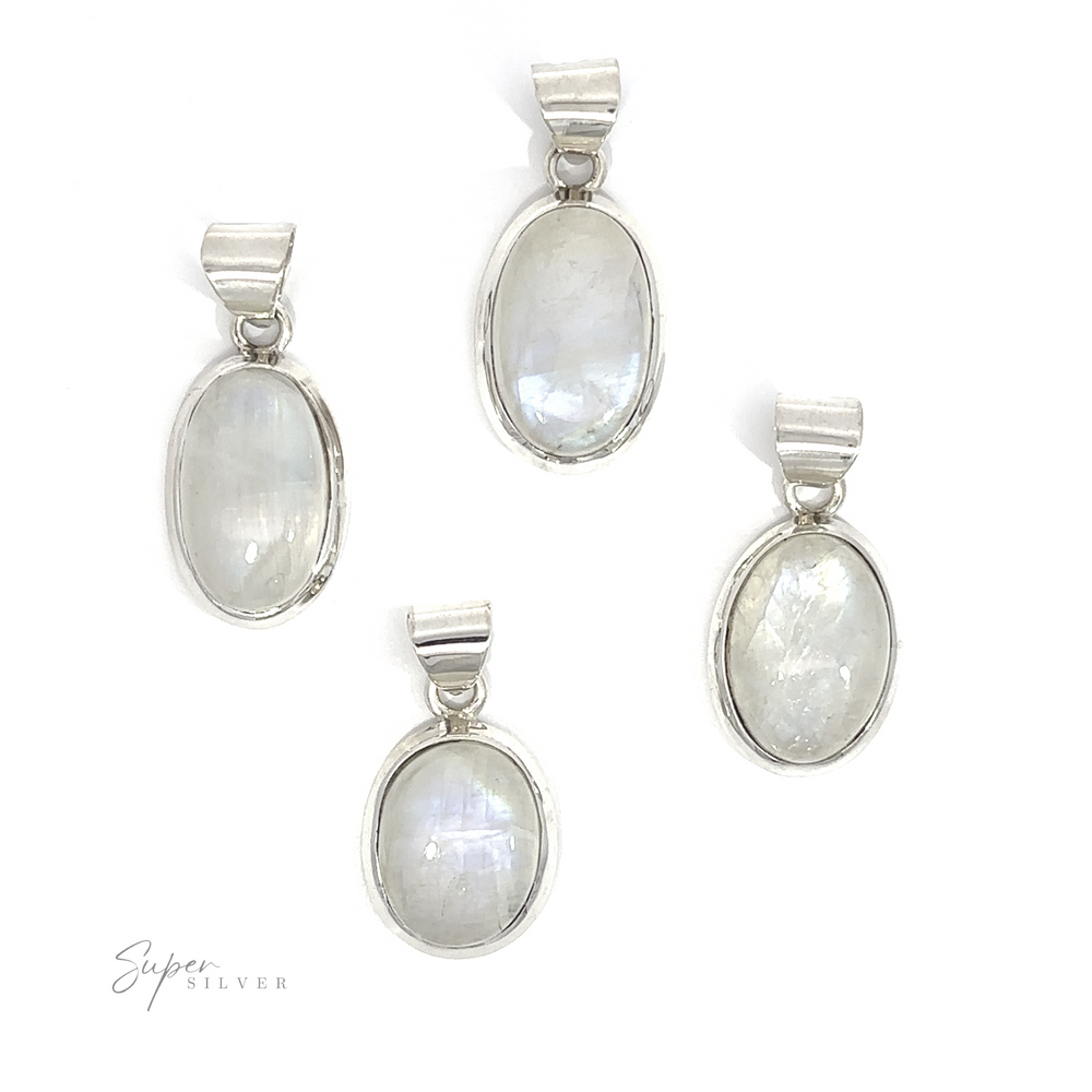 Four Simple Moonstone Oval Pendants with .925 sterling silver settings, displayed against a white background, each with a distinct orientation.