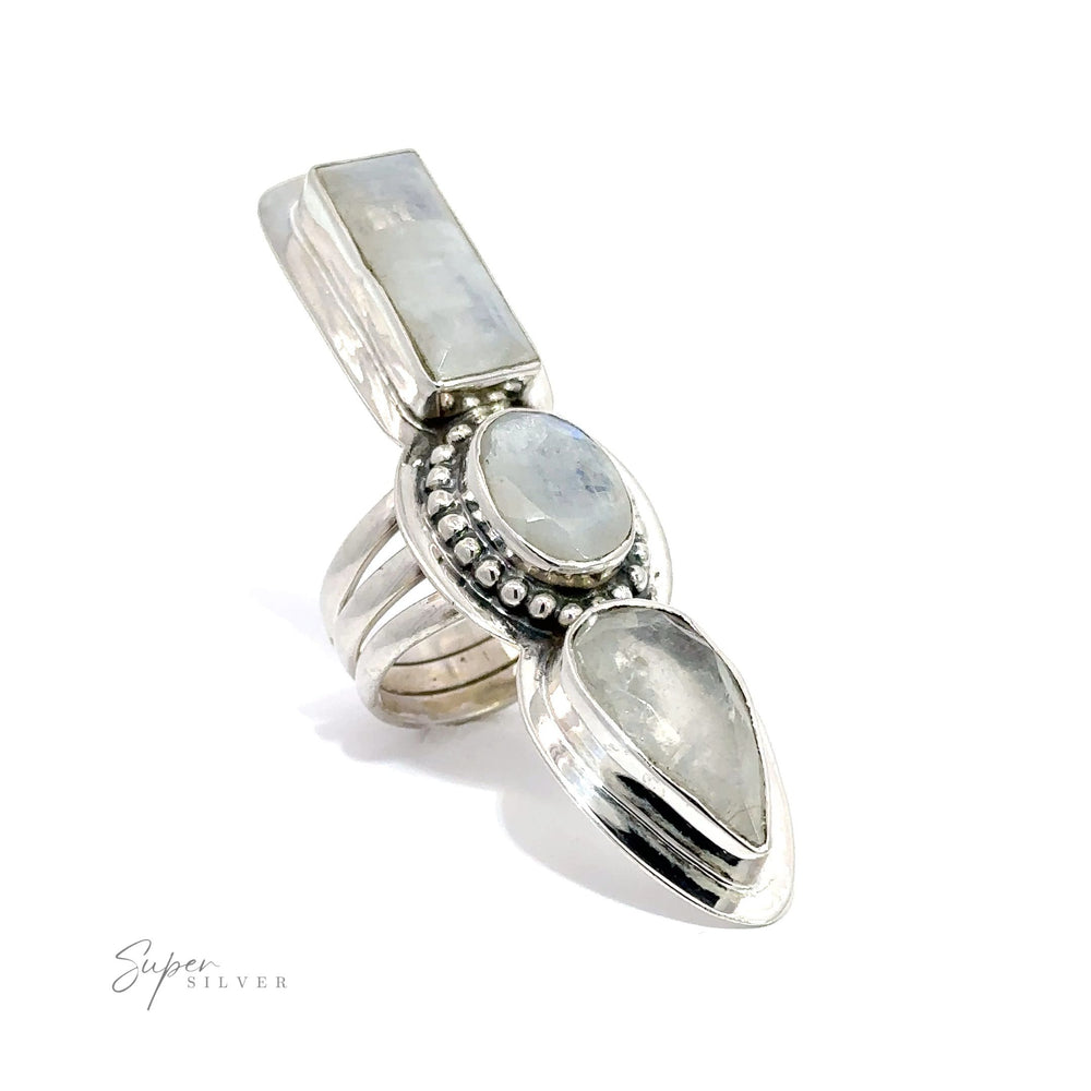 
                  
                    A Statement Faceted Moonstone ring with three stones on it.
                  
                