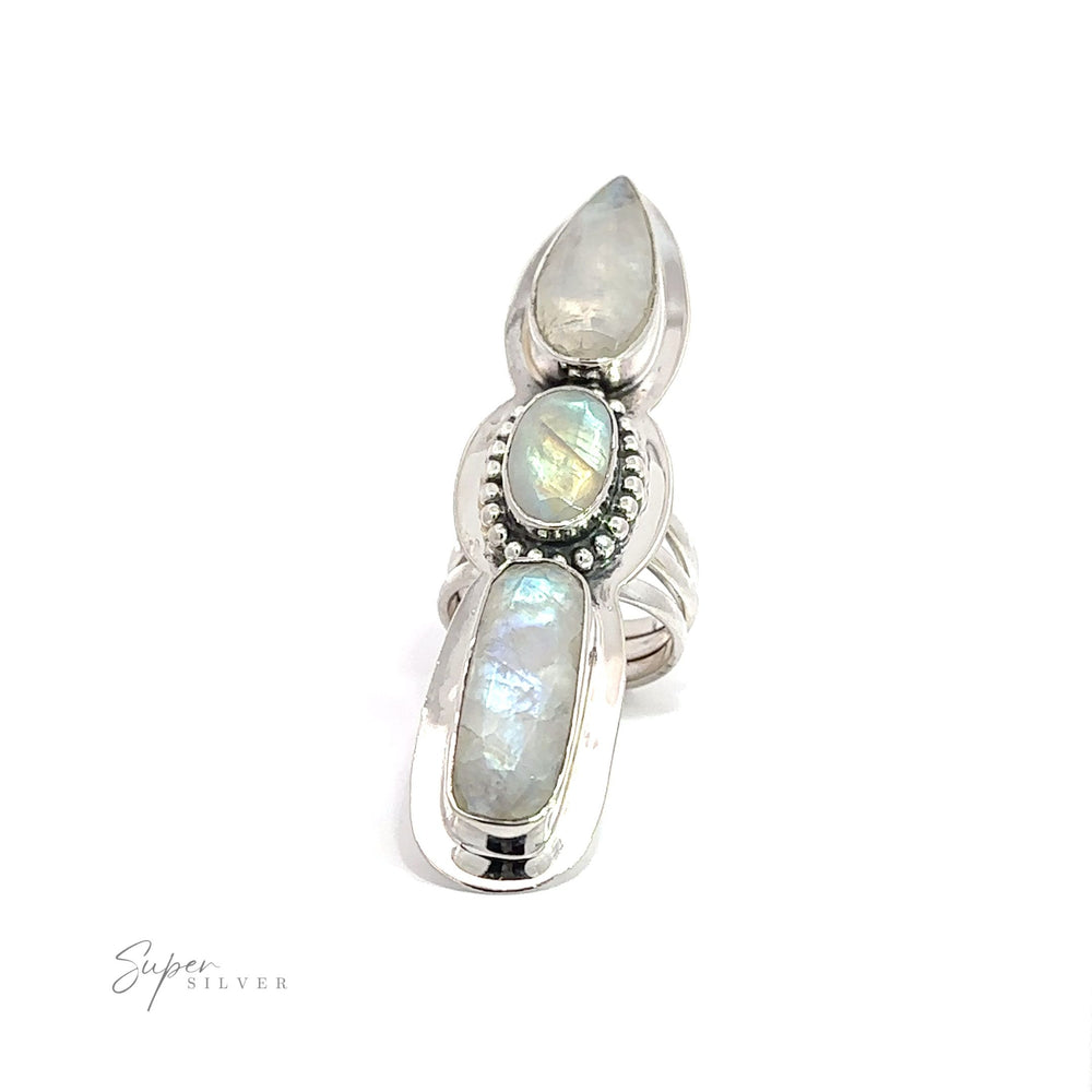 
                  
                    Description: A silver Statement Faceted Moonstone Ring adorned with three stones.
                  
                