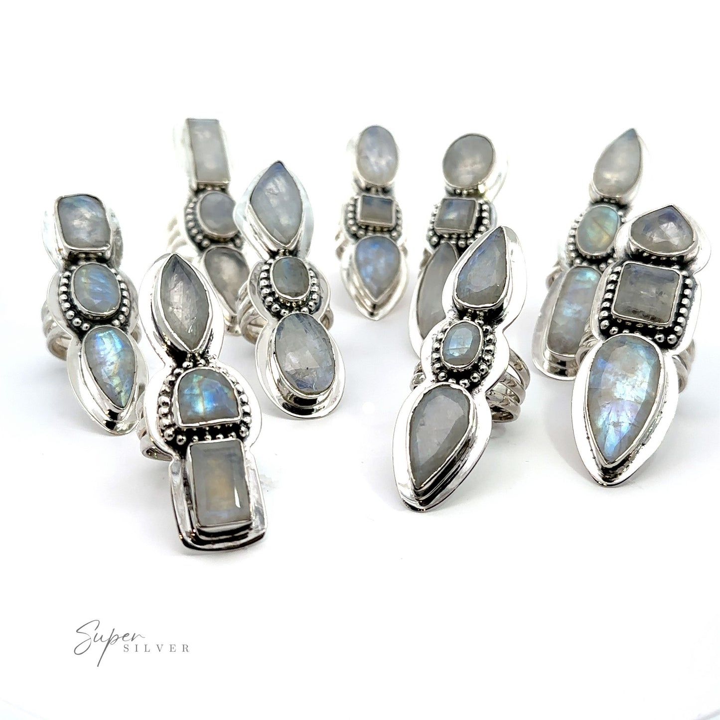 A set of sterling silver Statement Faceted Moonstone Rings with a variety of stones including a laptop sleeve.