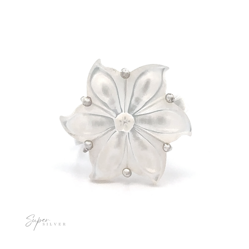 Adjusted Mother Of Pearl Flower Ring with sterling silver accents on a white background.