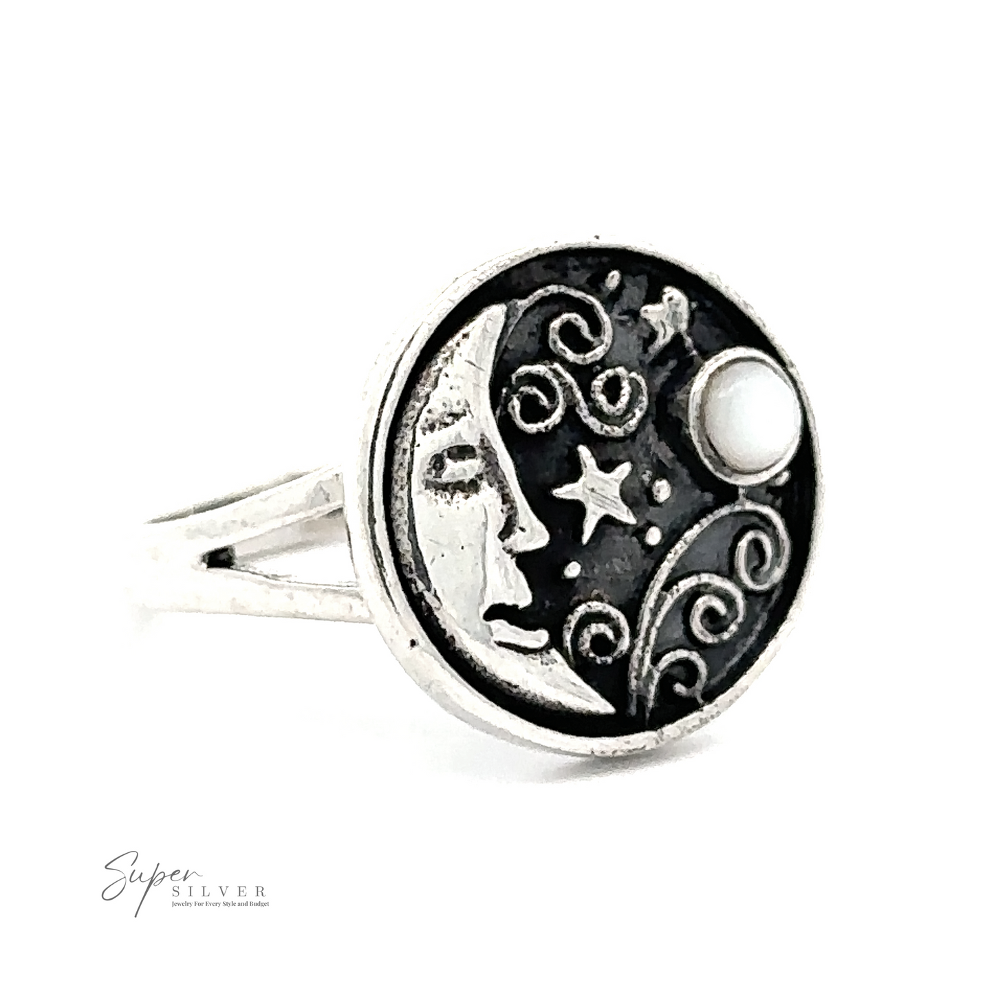 
                  
                    A Circular Vintage Style Moon Ring With Inlaid Stone featuring a round black face with a crescent moon, stars, and swirls design. The vintage style piece includes the brand name "Super Silver" in small text on the bottom left.
                  
                