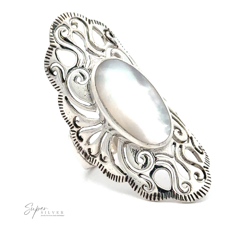 
                  
                    An ornate silver ring with a large oval pearl centerpiece exudes vintage charm. The band features intricate swirling patterns, reminiscent of the Long Vintage-Inspired Filigree Ring With Inlaid Stone. The logo "Super Silver" is visible in the bottom left corner, marking this piece as standout jewelry.
                  
                