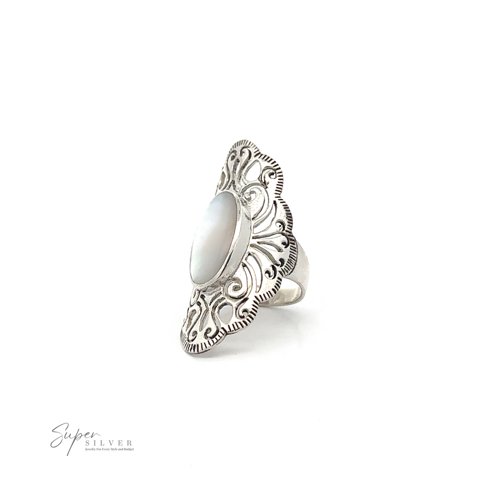 
                  
                    A Long Vintage-Inspired Filigree Ring With Inlaid Stone set in an intricately designed band evokes a vintage charm. Logo text reads "Super Silver" in the bottom left corner.
                  
                