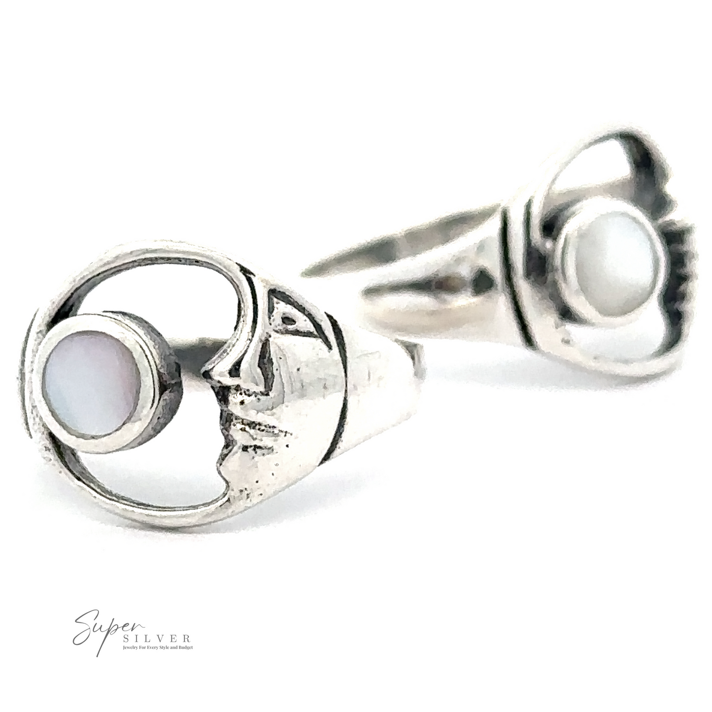 Two Crescent Moon Rings With Inlaid Stone, radiating celestial charm.