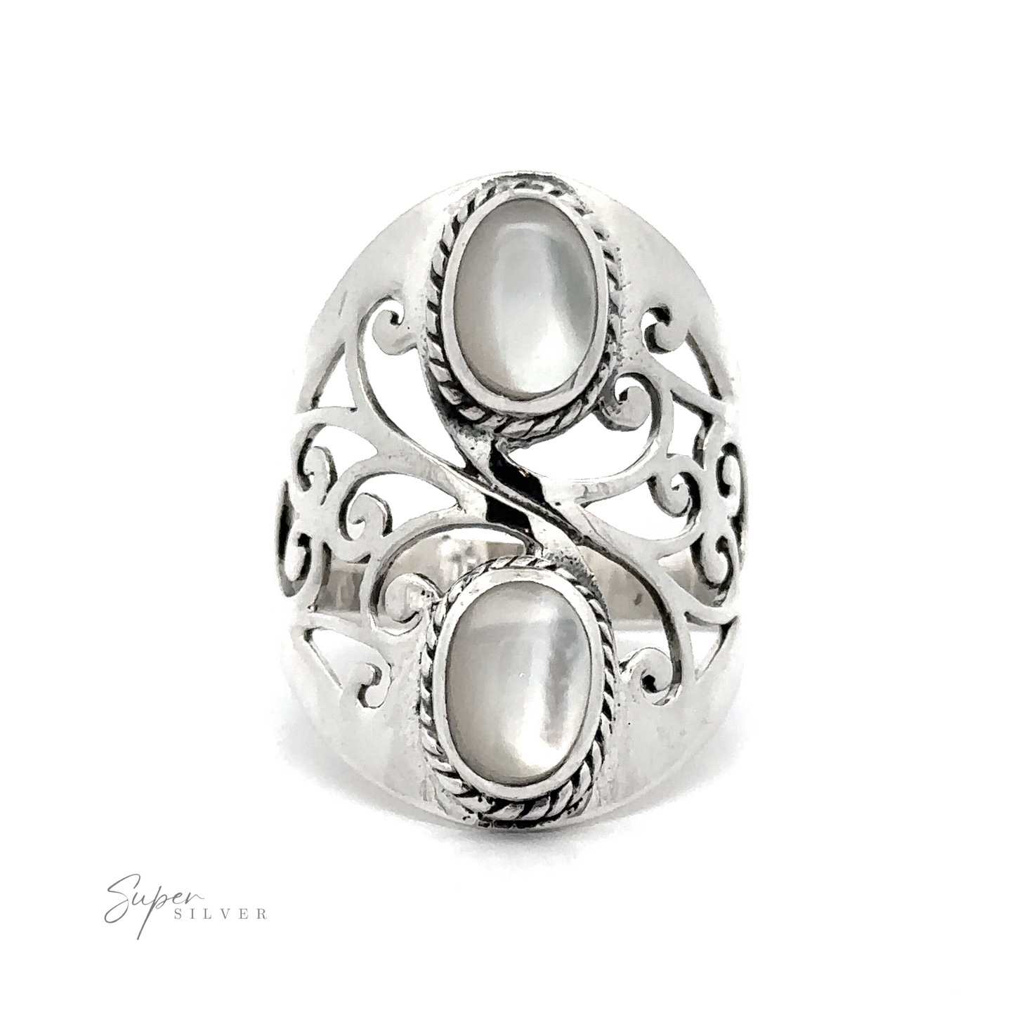 
                  
                    Introducing the Boho-Inspired Ring With Inlaid Stones: a stunning silver ring adorned with intricate filigree detailing and scrollwork design, featuring two cabochon-cut oval white stones. Complete with a "Super Silver" mark, this ring adds a bohemian twist to your style.
                  
                