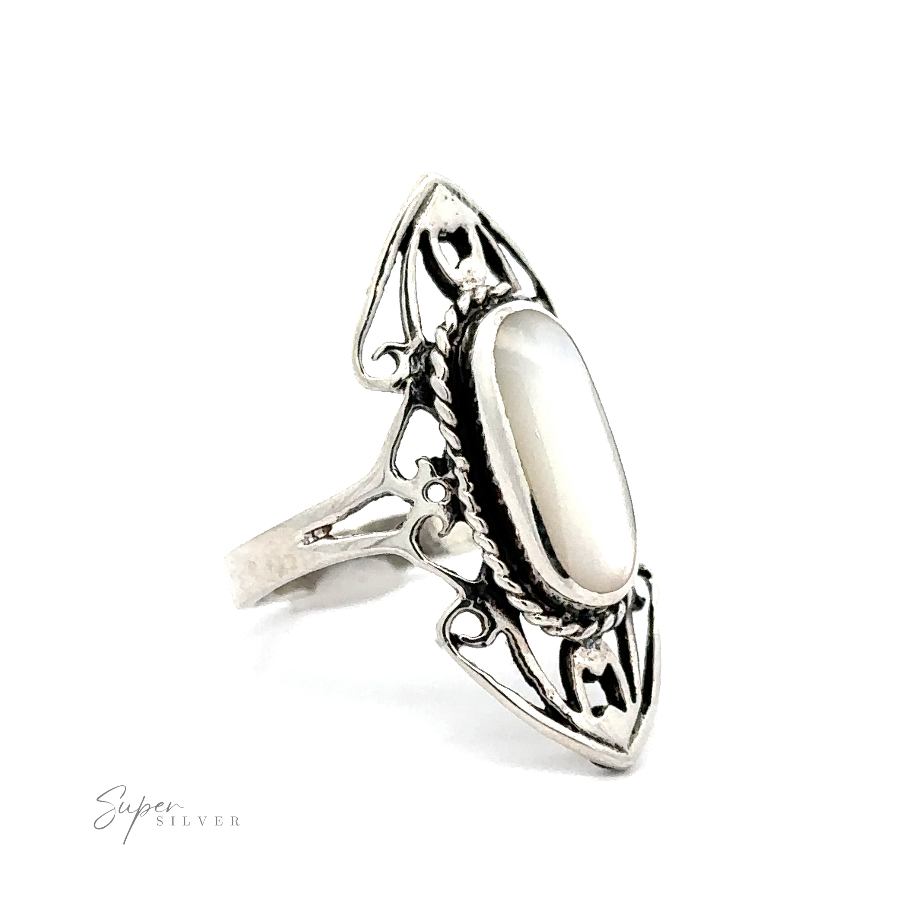 A sterling silver elongated filigree ring with an oval inlaid stone set in the ornate open band.
