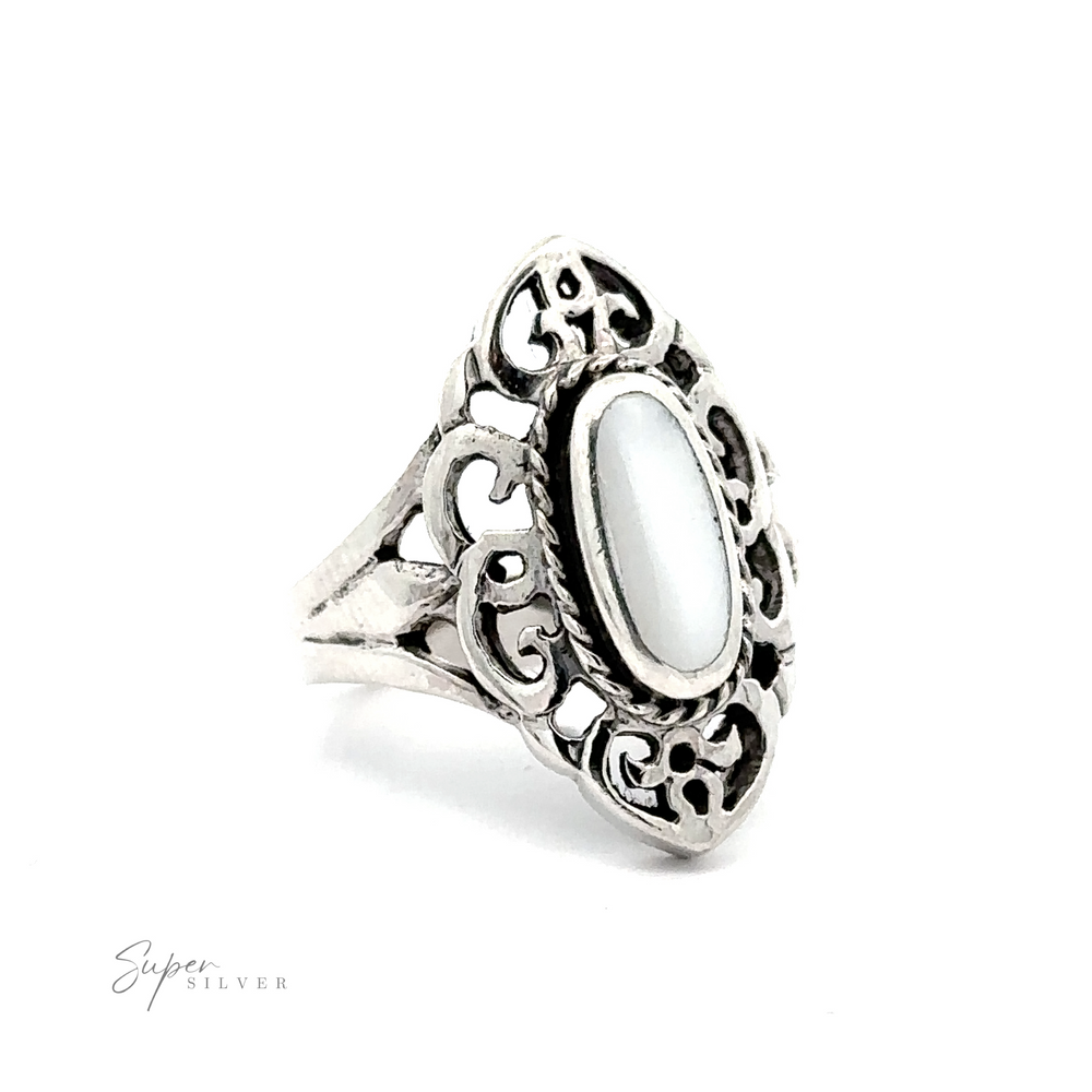 
                  
                    Marquise Filigree Inlay Stone Ring Vintage-style silver ring with a central marquise cabochon and intricate filigree design, exuding bohemian elegance.
                  
                