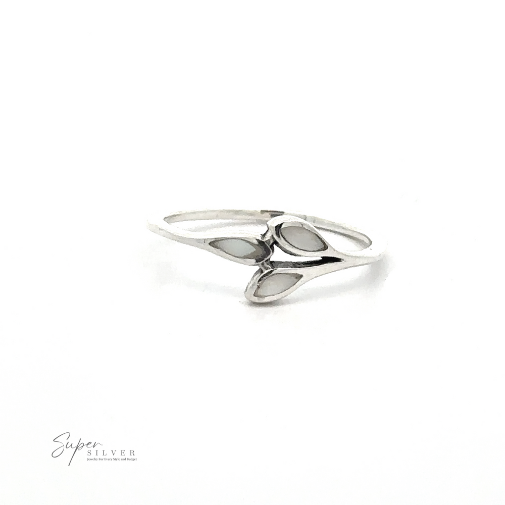 
                  
                    A delicate Tiny Leaves Ring with Inlaid Stones, displayed on a plain white background. The minimalist ring showcases the logo "Super Silver" in the bottom left corner.
                  
                