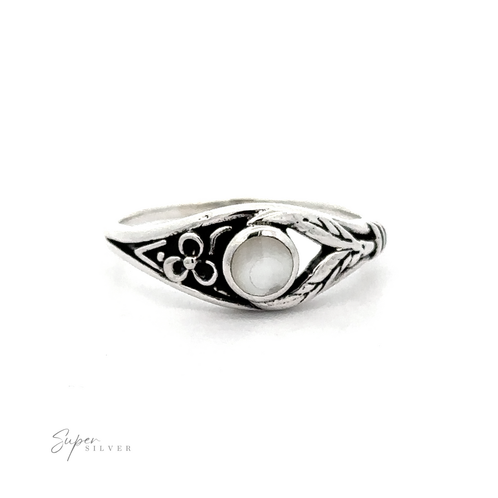 
                  
                    A Inlay Stone Ring with Flower and Leaf Design with a white stone and leaf design.
                  
                