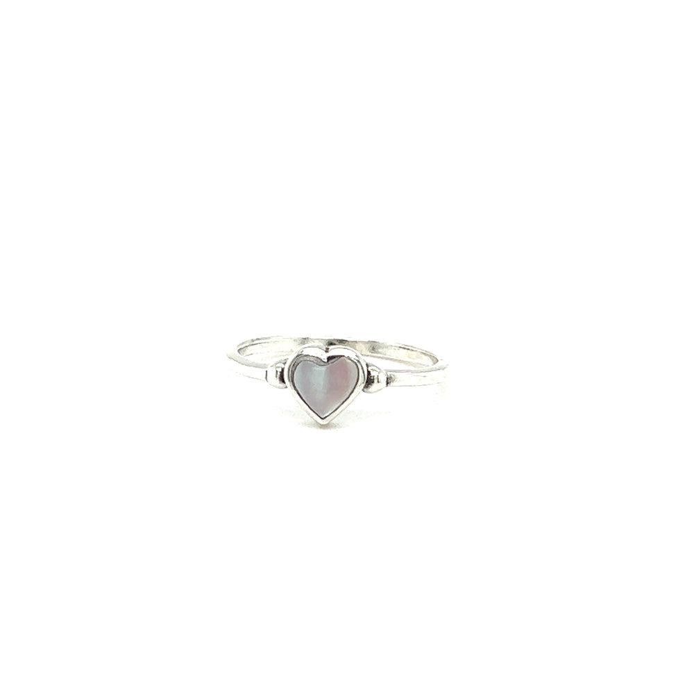 
                  
                    A Dainty Inlaid Heart Ring with a mother of pearl inlay.
                  
                