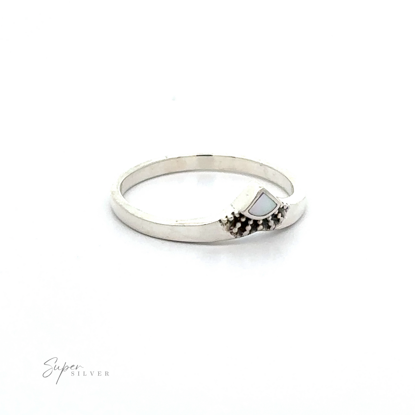 
                  
                    A Dainty Chevron Bali Style Inlay Ring with a white mother of pearl stone in the middle.
                  
                