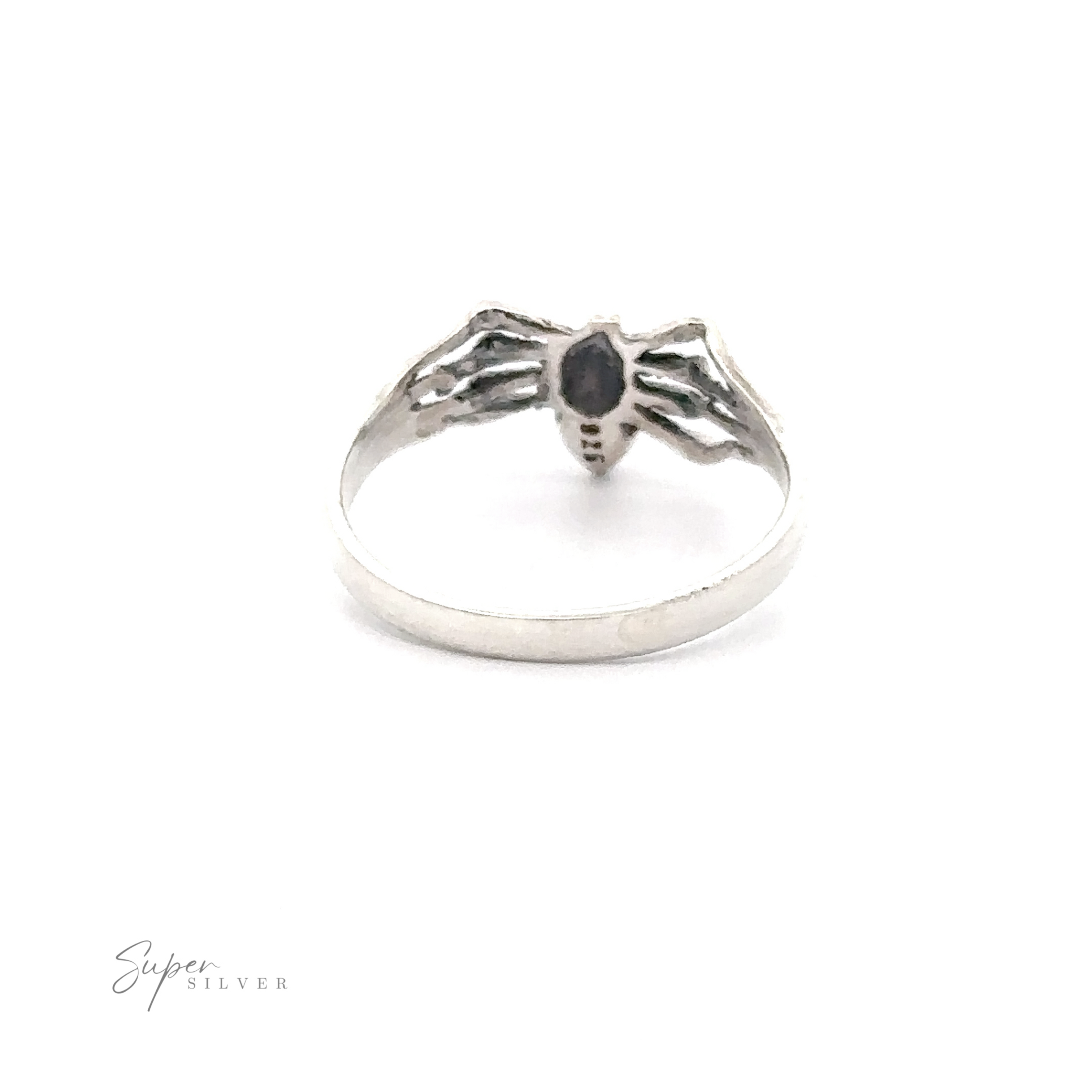 A Small Inlay Spider Ring featuring a spider design with a dark gemstone at its center, displayed on a plain white background. "Super Silver" is written in small text on the bottom left, adding to its allure as mystical jewelry.