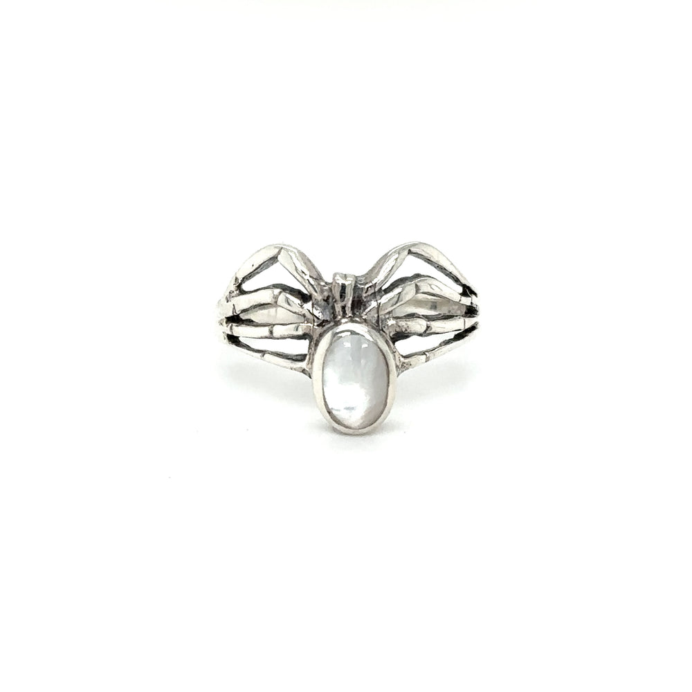 
                  
                    A Super Silver Inlay Stone Spider Ring with a white stone.
                  
                