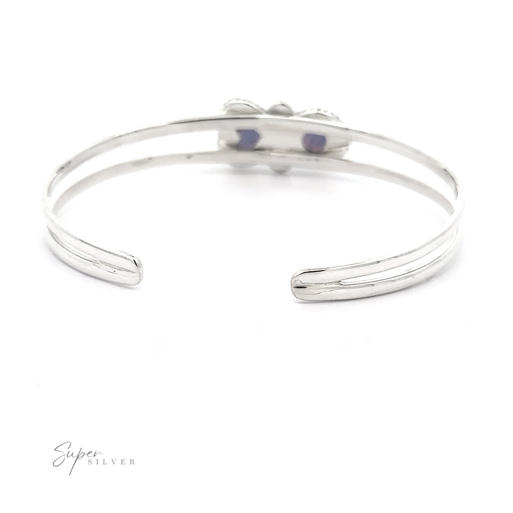 
                  
                    A sterling silver bracelet with a minimalistic design, featuring the brand name "Opal Heart And Circle Cuff Bracelet" in the bottom left corner. This romantic jewelry piece captures elegance effortlessly.
                  
                