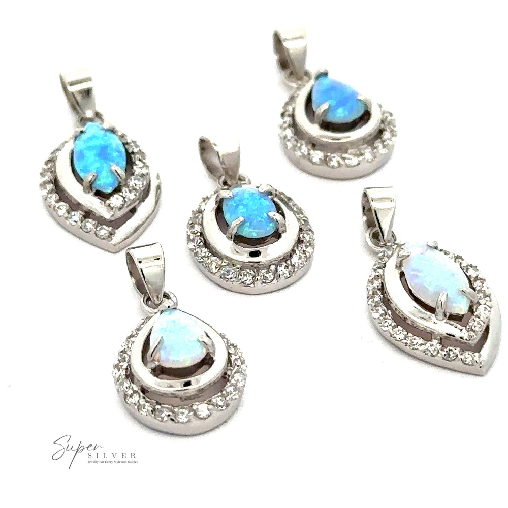 
                  
                    Five Opal Pendants with Cubic Zirconia, arranged on a white background.
                  
                