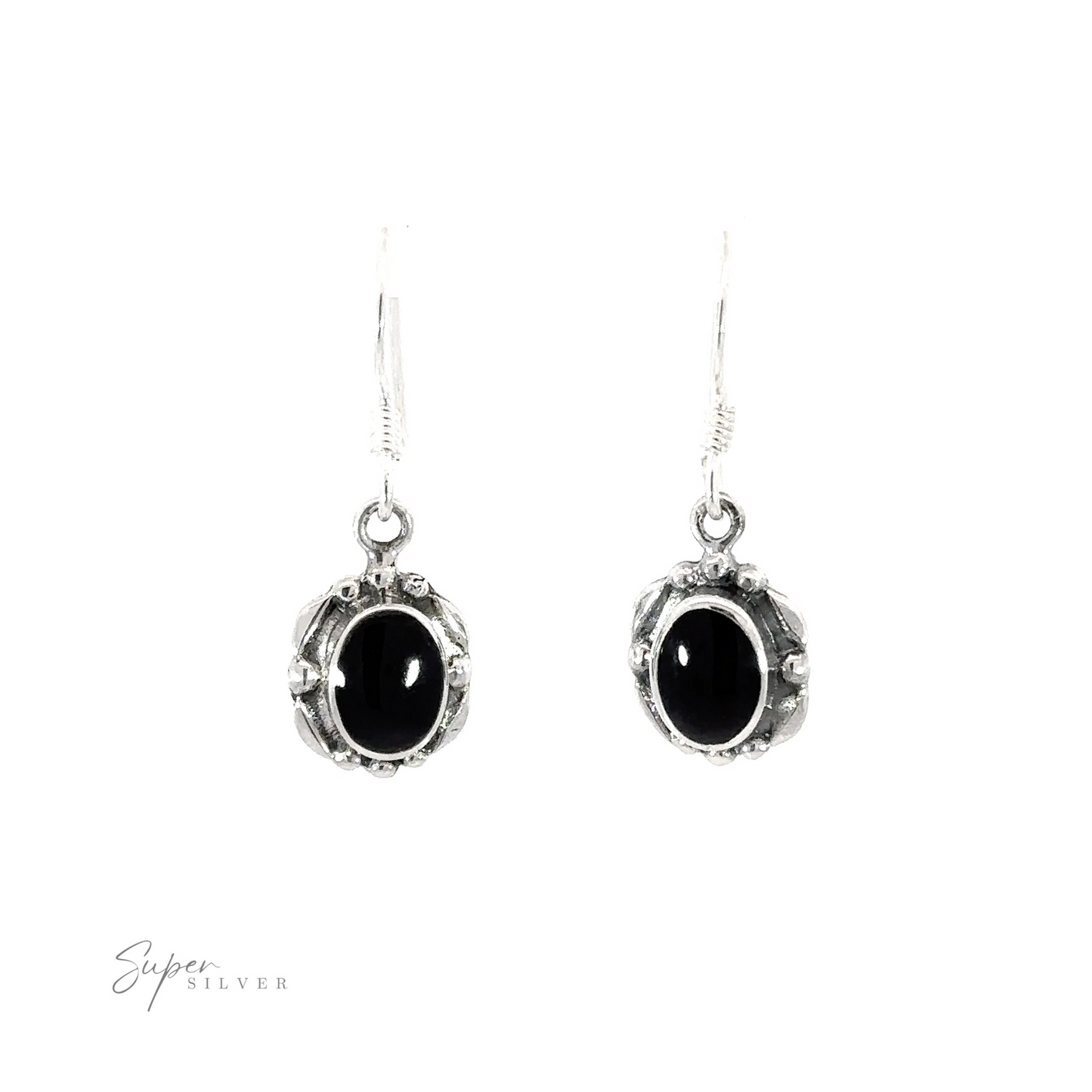
                  
                    A pair of Oval Inlaid Stone Earrings with inlaid black onyx stones on a white background.
                  
                
