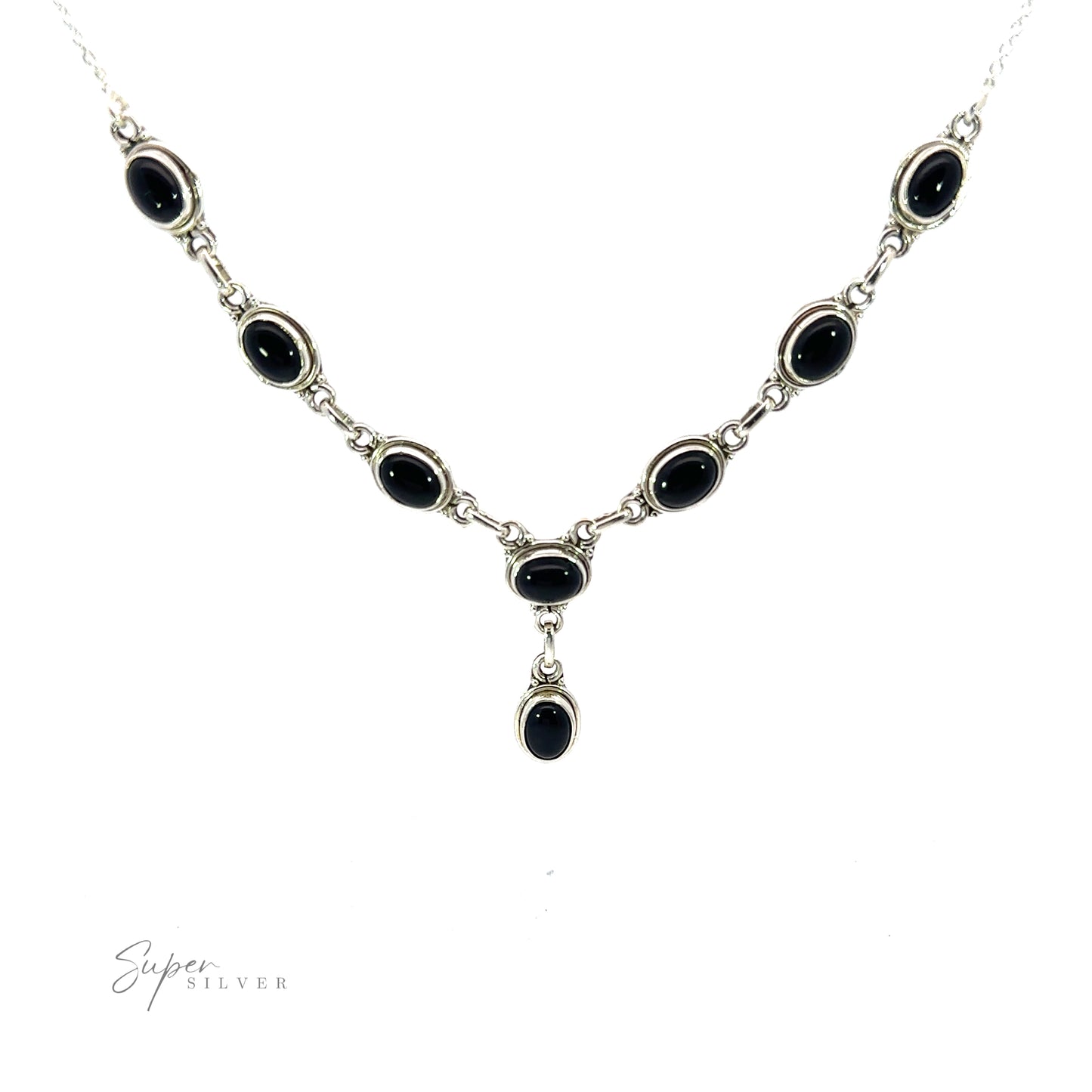 
                  
                    A Simple Oval Y Necklace with Gemstones featuring a series of oval gemstones set in individual links, with one stone hanging from the center. "Super Silver" branding is visible in the bottom left corner.
                  
                