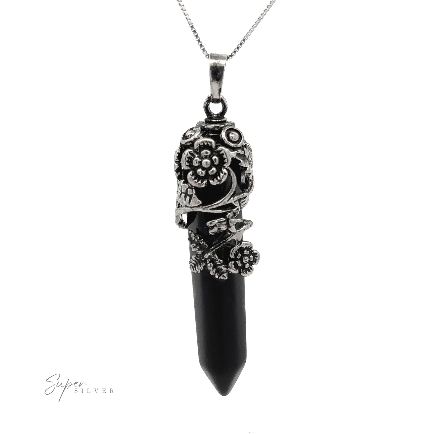 
                  
                    A Silver-Plated Flower Design Stone Pendant delicately cradles a black gemstone in a silver floral setting on a matching chain. The elongated, obelisk-shaped stone tapers to a point at the bottom. "Super Silver" is elegantly inscribed in the lower left corner.
                  
                