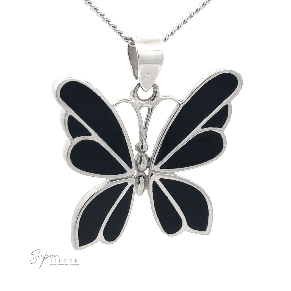 
                  
                    A **Medium Inlay Butterfly Pendant** with black inlays on a silver chain. The text "Super Silver" is visible in the lower left corner, adding a touch of elegance to this stunning piece.
                  
                
