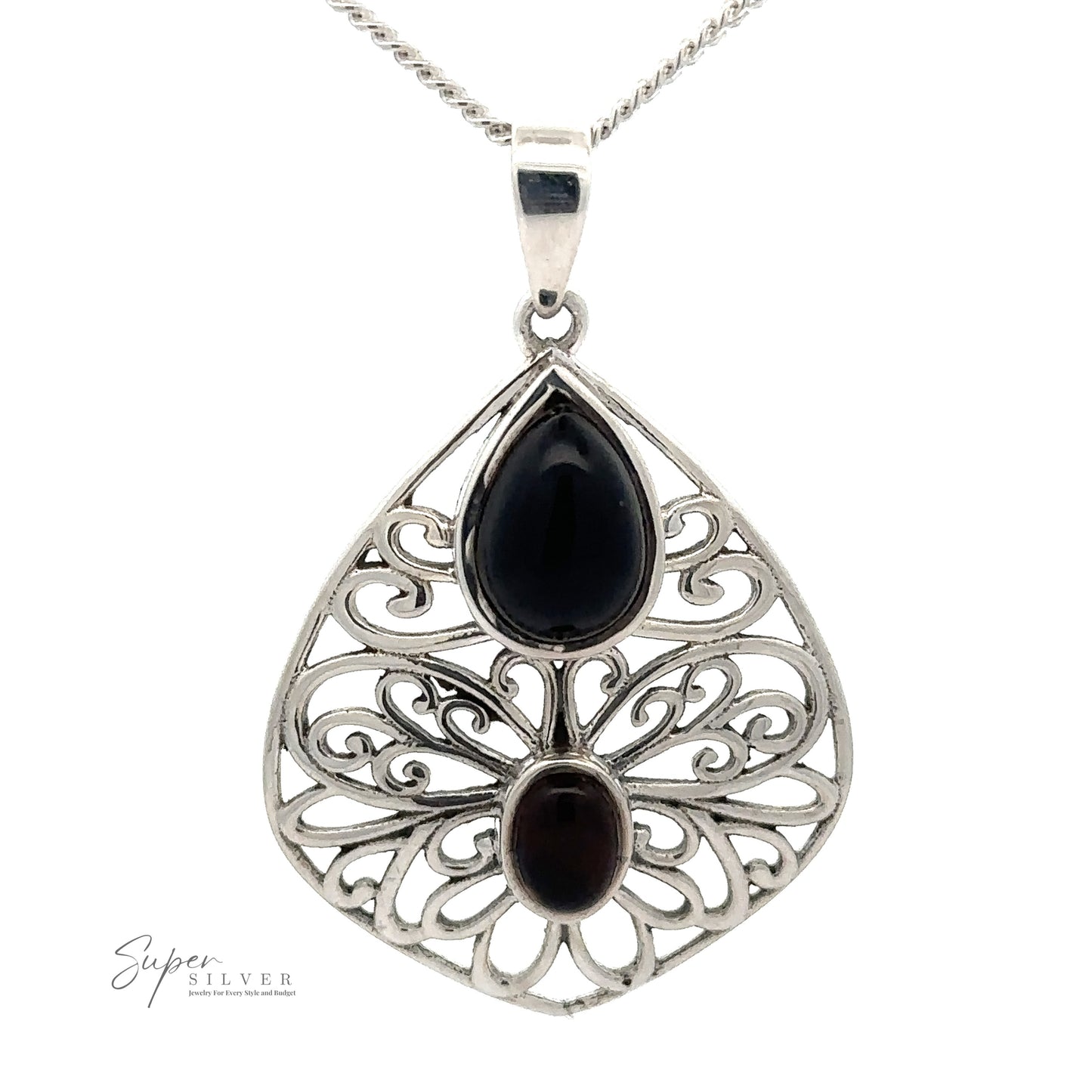 
                  
                    A Teardrop Filigree Gemstone Pendant featuring intricate designs with one teardrop-shaped Onyx stone and one oval-shaped dark brown stone, hung on a thin silver chain.
                  
                