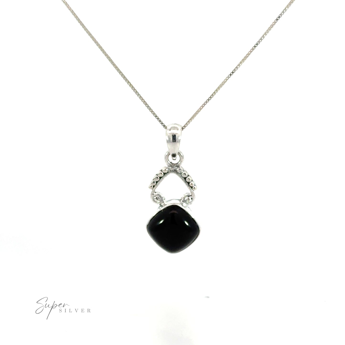 
                  
                    A diamond shaped gemstone pendant with a bohemian flair, featuring a black onyx and diamond design, displayed beautifully on a white background.
                  
                