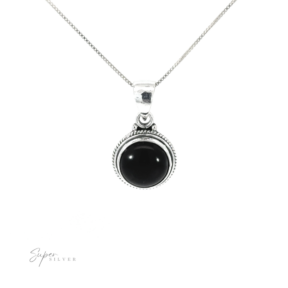 
                  
                    A Round Stone Pendant with Rope Border on a silver chain.
                  
                