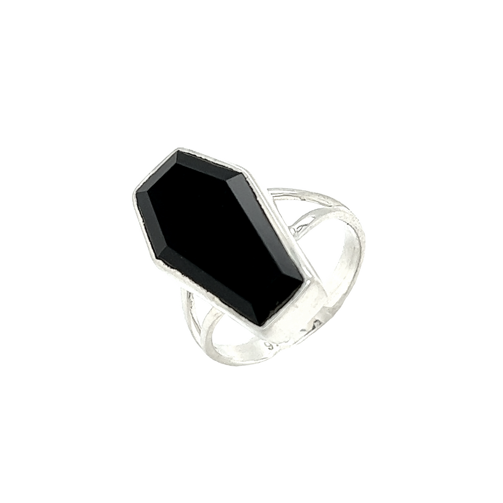 A spooky gothic mystique, Super Silver's Faceted Onyx Coffin Ring set against a white background.