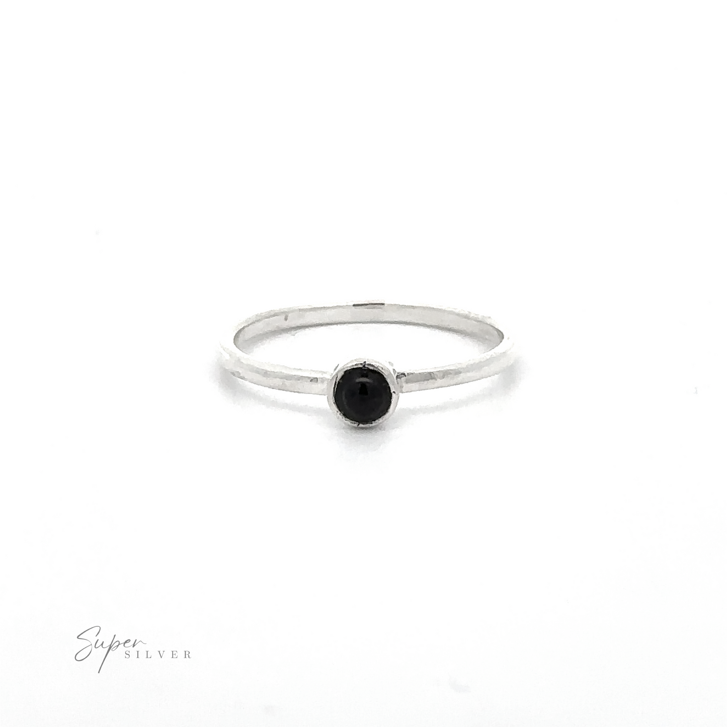 
                  
                    A simple silver ring featuring a small, round black gemstone in its center, perfect for minimalist fashion. The thin band adds to its elegant simplicity. Made of sterling silver, this Dainty Stackable Round Gemstone Ring has "Super Silver" visible in the bottom left corner.
                  
                