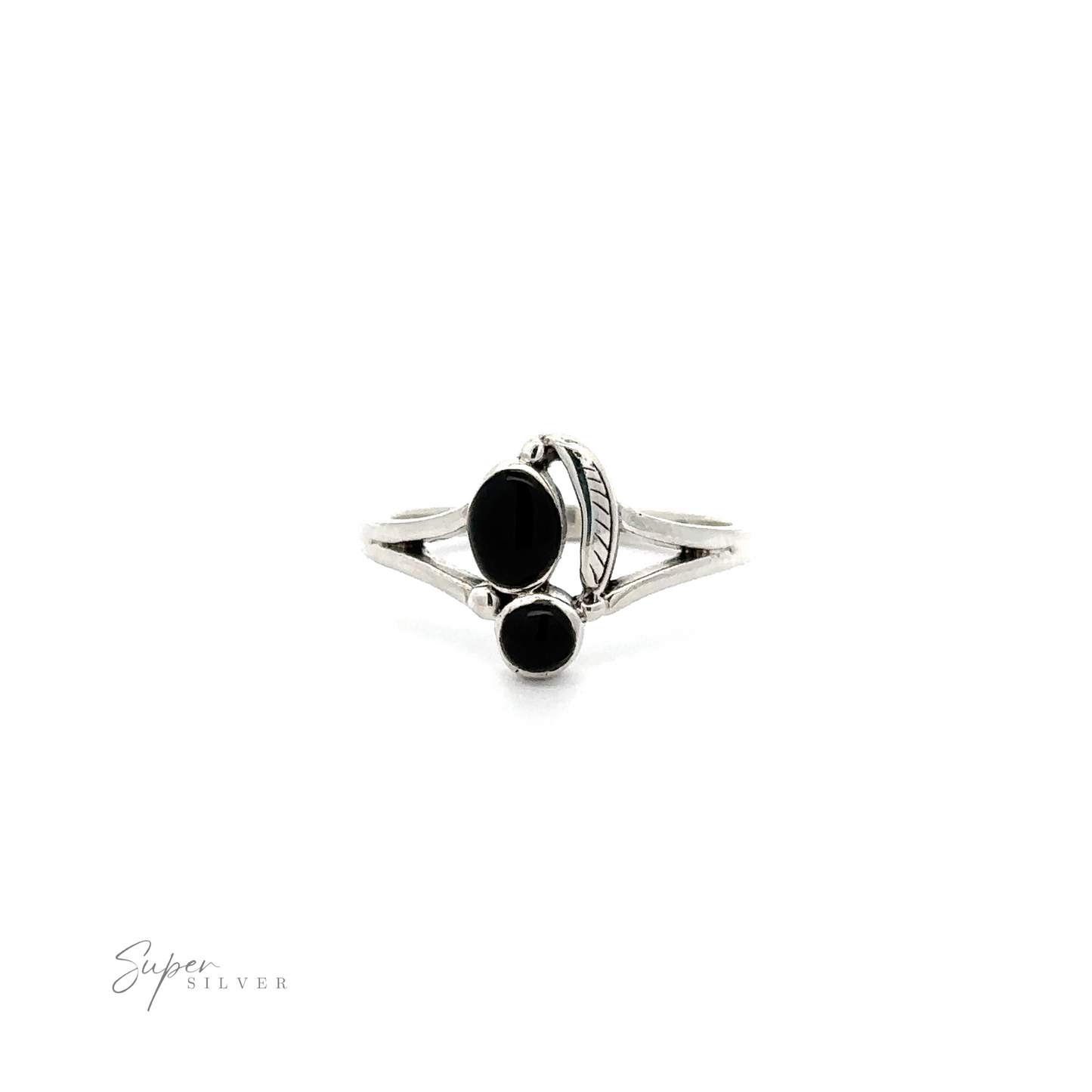 
                  
                    An inlaid sterling silver Stone and Feather Ring with black stones.
                  
                