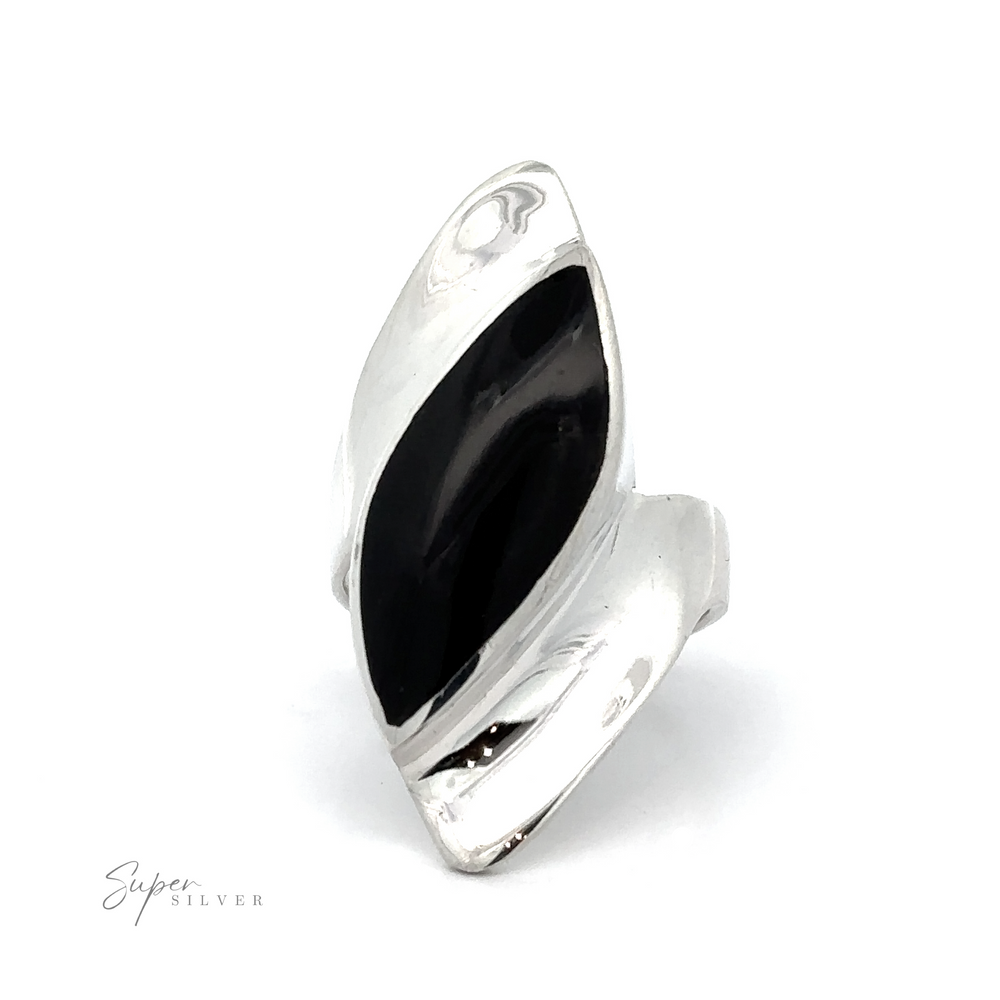 
                  
                    A Modern Marquise Shaped Inlaid Stone Ring with inlaid black onyx, set against a white background.
                  
                