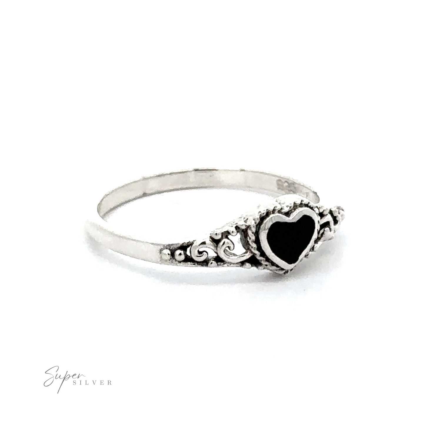 
                  
                    A Dainty Heart Filigree Ring with Inlaid Stones with Bali-style filigree design on a white background.
                  
                