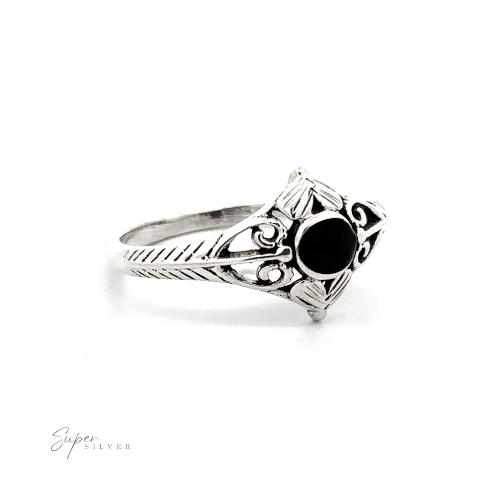 
                  
                    A sterling silver ring with an Inlaid Stone Diamond Shaped Ring with Filigree Accents.
                  
                