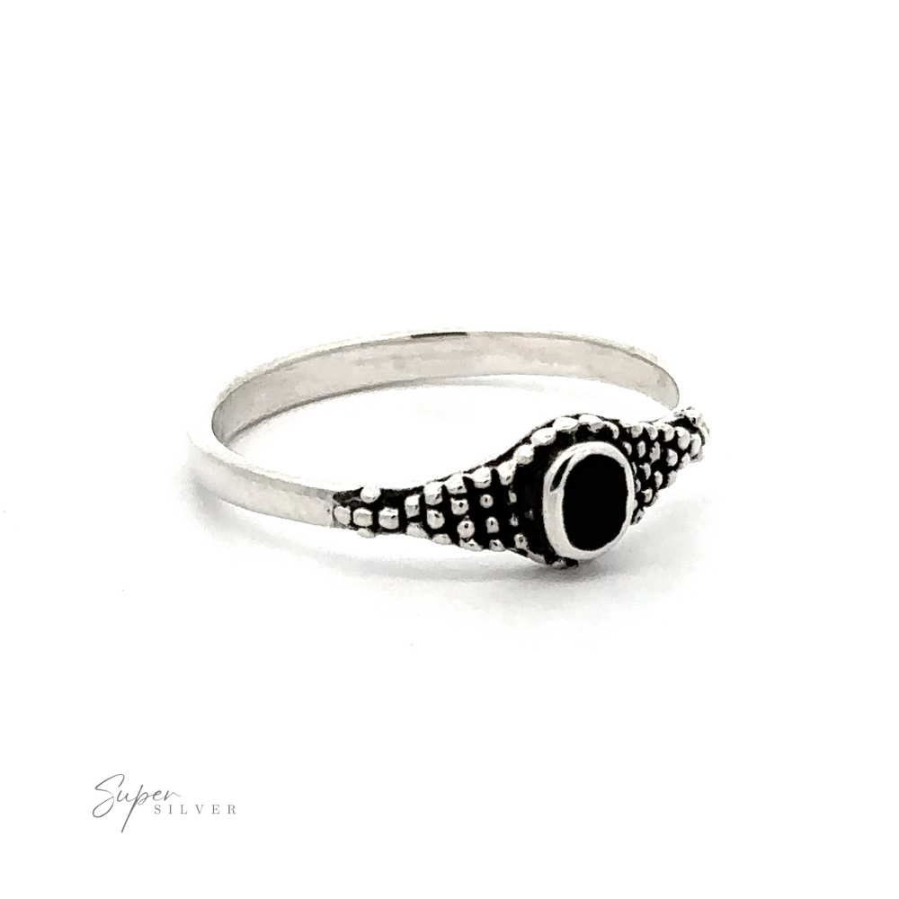 
                  
                    A Dainty Inlaid Ring with Beaded Texture featuring Bali-style beading for a unique touch.
                  
                