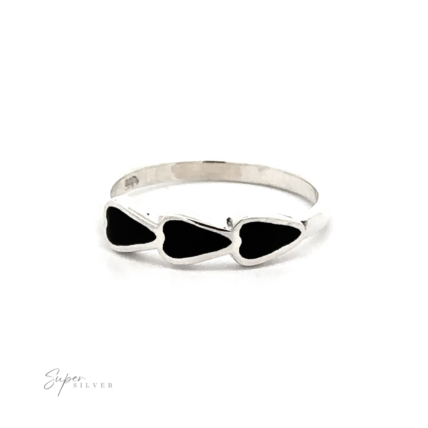 
                  
                    A Triple Heart Ring with Inlaid Stones with three heart-shaped black onyx stones.
                  
                