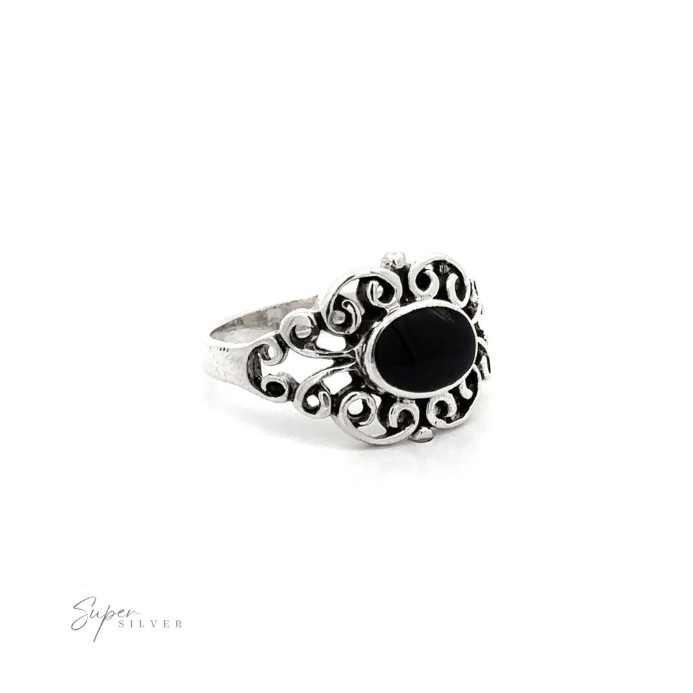 
                  
                    A Victorian Filigree Inlay Stone Ring with a black stone.
                  
                