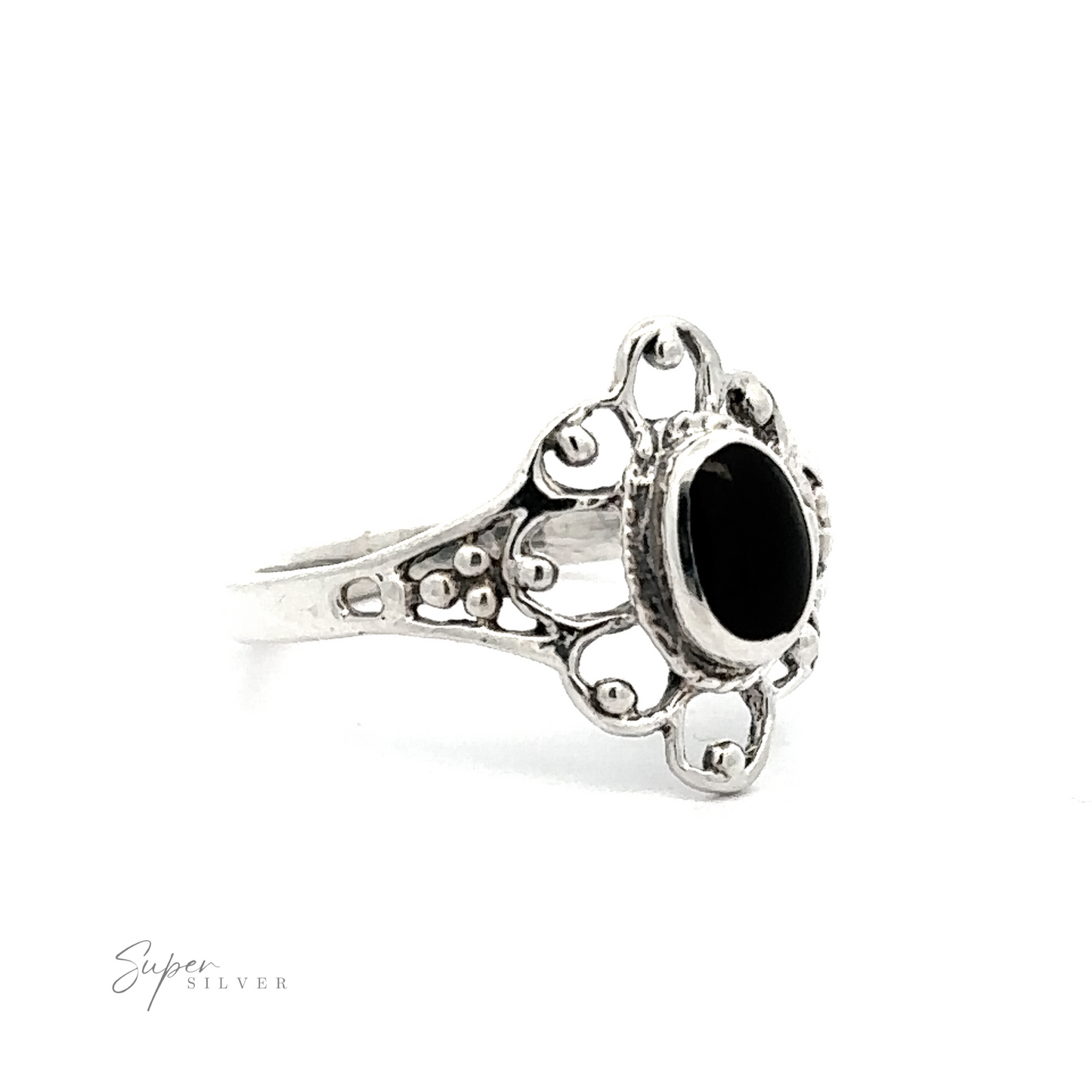 
                  
                    A vintage-styled flower ring with inlaid stones.
                  
                